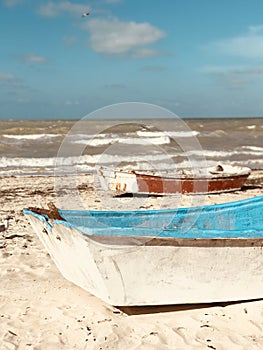 Rustic boats on the shores of Progreso - Yucatan - Mexico photo